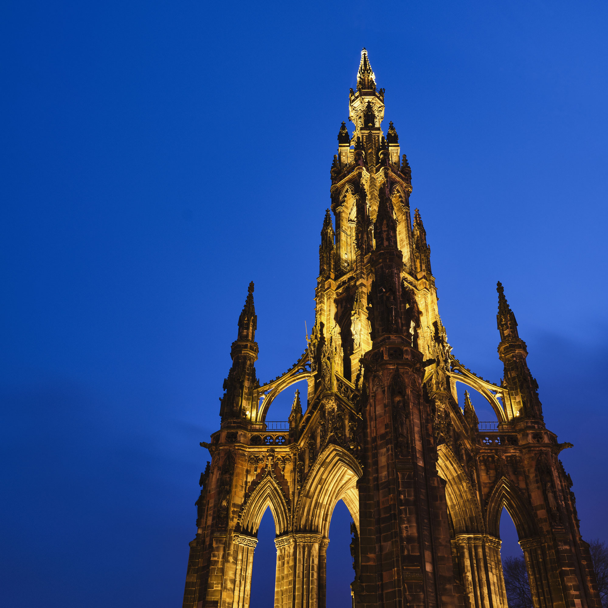Scott Monument blue and lit at Edinburgh, South East, Scotland — a photography location from The Photos book series